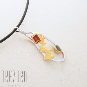 Adventure Road Designer Pendant. Sterling Silver with  Garnet and Sapphire, Rhodium and Gold Plated. On grey 2.